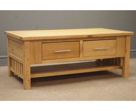 Light oak coffee table with two push through drawers, stile supports joined by an undertier, W110cm, H45cm, D60cm Condition R