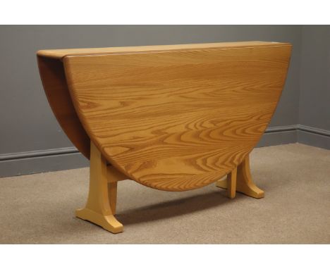 Ercol elm and beech oval drop leaf table, gate action support, sledge feet, W128cm, H72cm, L140cm Condition Report Click here