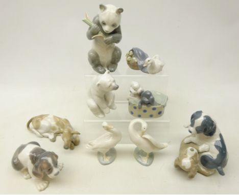 Collection of Lladro and Nao animal models including a Nao Panda, Lladro puppy, Nao dog group, Lladro calf, Lladro Polar Bear