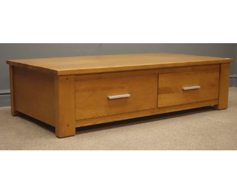 Light oak coffee table, four drawers, stile end supports, (W140cm, H37cm, D71cm) and a matching lamp table with under tier an