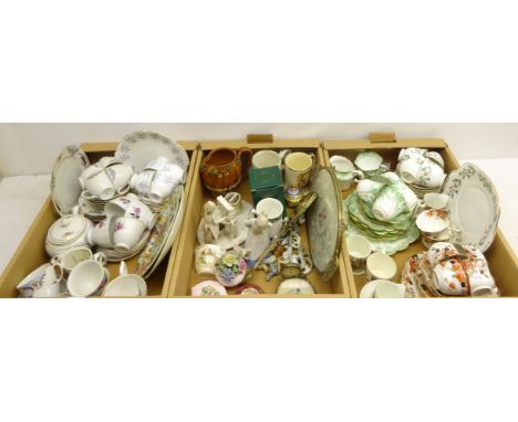 Crown Staffordshire part tea set, other teaware, small ceramic figures including Wade Whimsies, abstract model of a lady with