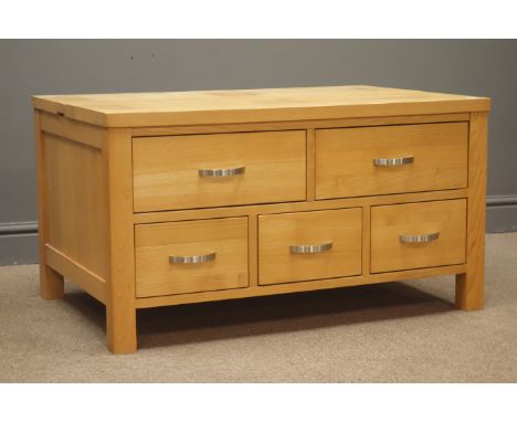 Light oak coffee table chest with half hinged top, three short and two long drawers, stile supports, W92cm, H50cm, D60cm Cond