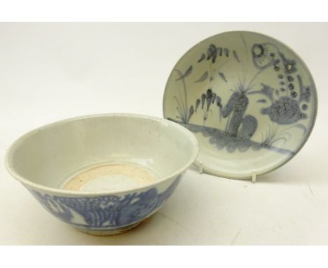 Two Tek Sing cargo pieces: pedestal bowl painted with mountainous river landscape scene and saucer dish painted with bamboo a