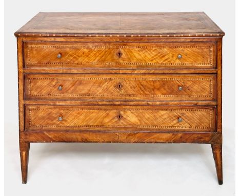 LOMBARDY COMMODE, 18th century Italian figured walnut and chequer and banded with three long drawers, quartered top and taper