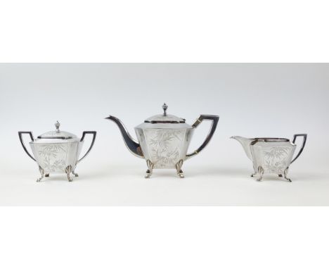 A CHINESE SILVER THREE PIECE TEA SERVICE, early 20th century, comprising teapot, milk jug and lidded sugar bowl, engraved pal