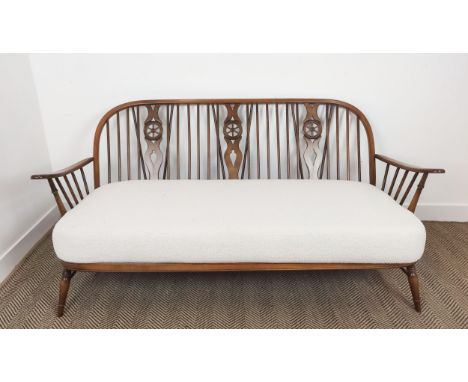 ERCOL SOFA, beechwood with boucle wool seat cushion, 82cm H x 174cm W x 86cm D.