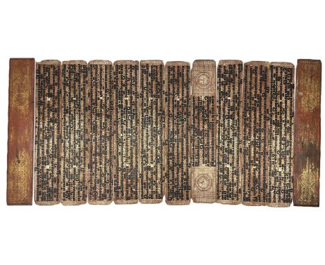 Burmese kammavaca manuscript, consisting of two lacquered wooden covers and ten double-sided folios with black, red and gold 