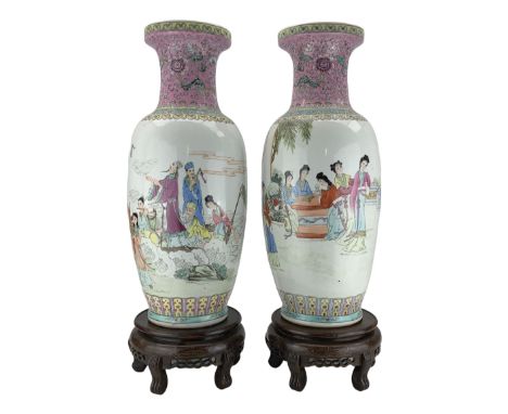 Pair of Chinese Famille Rose porcelain vases, depicting sages, deities and musicians on a boat and ladies seated around a tab