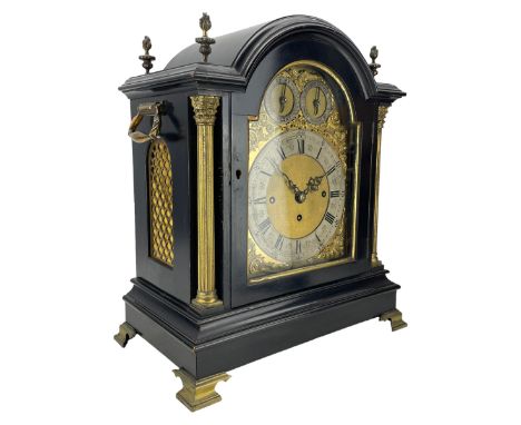 Edwardian - English ebonised 8-day bracket clock in a break arch case with flambe finials and reeded columns with Corinthian 