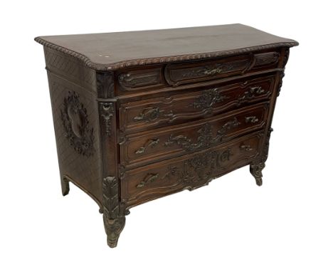 Early 20th century French design commode or chest, serpentine form with gardroon and foliate carved top, fitted with small fr