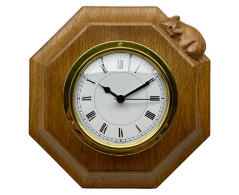 Mouseman - oak and brass wall clock, circular Roman dial in brass drum on moulded octagonal mount carved with mouse signature