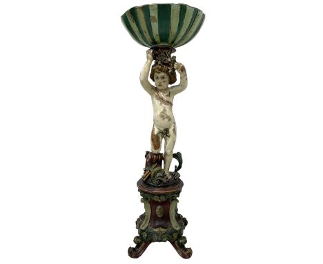 Italian design polychrome carved wood figure depicting Putto holding a shell aloft, shaped shell form basin resting on the he