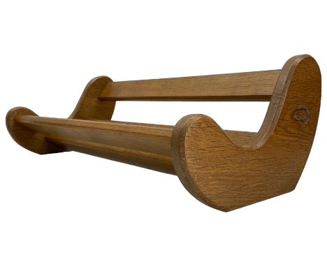 Acornman - oak book trough, boomerang end supports, carved with acorn signature, by Alan Grainger, Brandsby, YorkDimensions: 