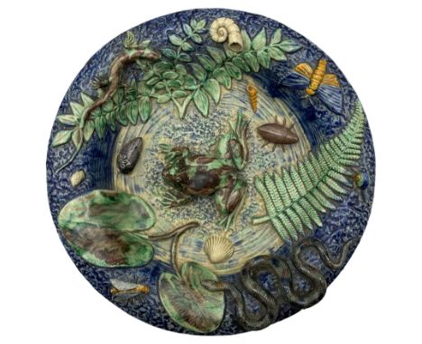 19th century French Palissy ware dish, a frog applied to the middle on a textured blue ground surrounded by shells, insects, 