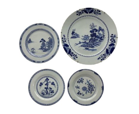 18th century Chinese Export porcelain blue and white charger, centrally decorated with pagoda beneath a rocky outcrop on the 