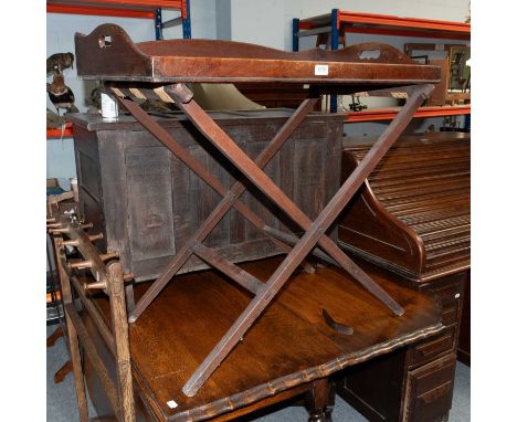 A Mahogany Butlers Tray on Stand, 83cm by 52cm by 81cm together with a late Victorian oak whip stand, 85cm by 104cm