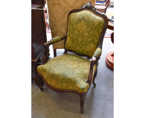 A French Carved Walnut Fauteuil