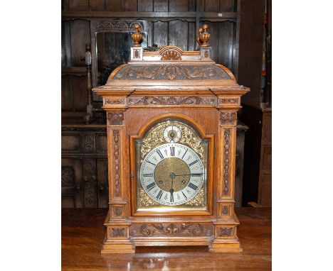 An Oak Cased Quarter Striking Table Clock, circa 1900, twin barrel movement striking on two gongs, 43cm highMovement not work