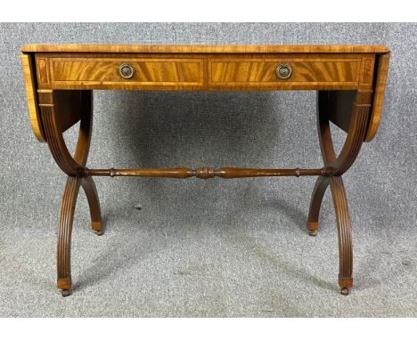 A Regency style mahogany and crossbanded sofa table. H.73 W.95 (142 extended) D.55cm