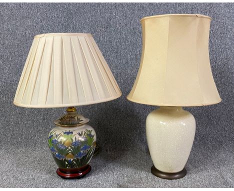 Two Oriental style baluster form ceramic table lamps with shades. H.63cm (largest)