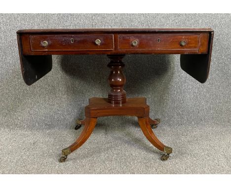 A Regency mahogany and ebony strung sofa table. H.72 W.91 (146 extended) D.59cm