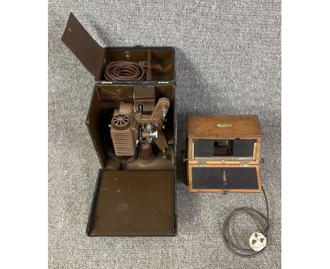 A Revere model 80 8mm projector and a Richard veriscope. H.37 W.27 D.20cm (largest)