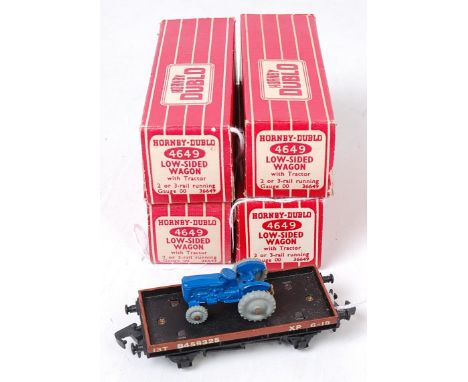 Four H-Dublo 4649 low sided wagons with tractor (E near M) (BE)