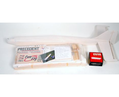 A part complete balsa wood own design semi built kit titled Met 2, sold with an Enya 40 engine and pre-formed under carriage 