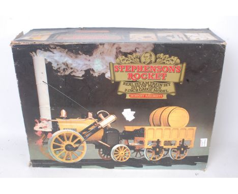 A boxed Hornby Railways 3½" gauge Stephenson's Rocket train set, comprising locomotive and tender, with various funnels and a