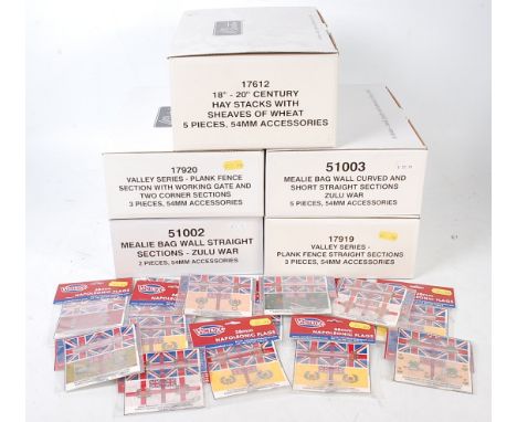 A collection of Britains and Victrix Ltd diorama accessories and flag group to include Britains No. 17612 18-20th century hay