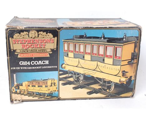 A Hornby Railways boxed 3½" gauge Stephenson's Rocket, G104 coach, appears complete and in the original all-card box