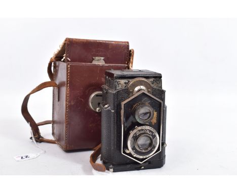 AN IKOFLEX 850/16 EARLY COFFEE CAN TLR CAMERA in leather case ( missing lens surround)