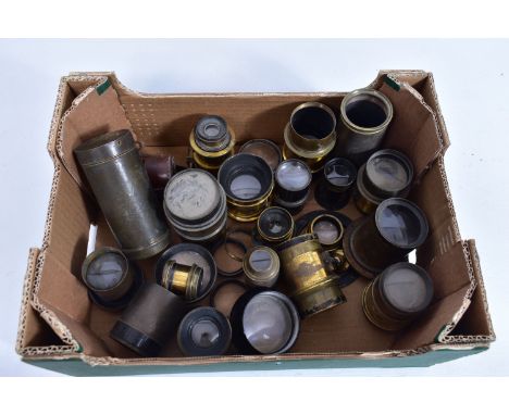 NINETEEN VINTAGE FIELD CAMERA LENSES of various sizes and fitting, mostly brass bodied, mostly no makers marks but named one 