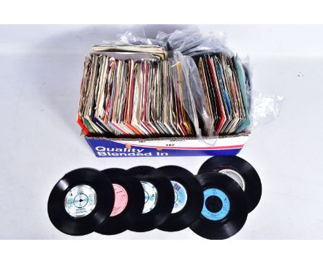 A TRAY CONTAINING APPROX TWO HUNDRED SINGLES mostly from 1980s including Duran Duran, Elvis Costello, ABBA, Toy Dolls, Saxon,