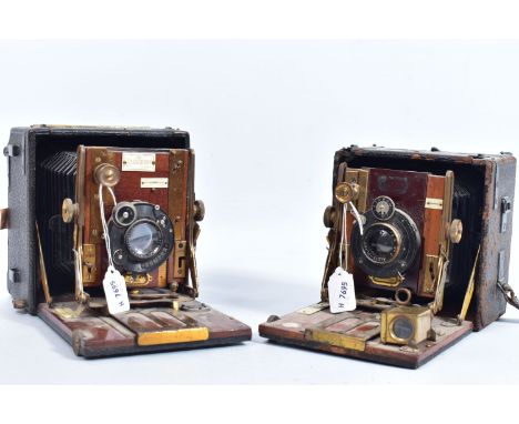 TWO SANDERSON FIELD CAMERAS including a Deluxe with black fabric finish over mahogany frame, Compur shutter release,Lumax Ana