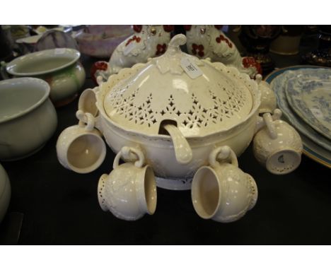 Leeds cream ware pottery punch bowl, ladle and cups