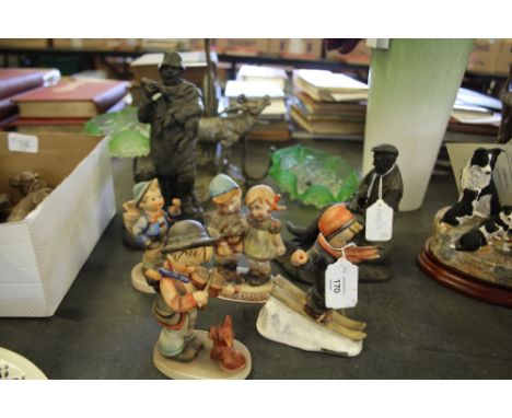 Two Heredities figures and four Goebel figures
