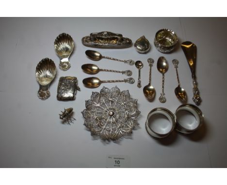 Quantity of silver and white items to include filigree trinket tray, vesta case, 6 spoons with filigree, silver napkin rings,