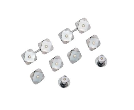 A Mother-of-Pearl and Split Pearl Button, Dress Stud and Cufflink Suite comprising of four buttons, two studs and a pair of c