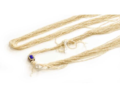 A Fifteen Strand Seed Pearl Necklace, with enamel and split pearl clasp, length 122cm (a.f)Gross weight 42.74 grams.