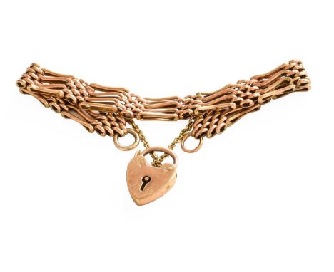 A Gate Link Bracelet, padlock and end link stamped '9CT', length 19.8cmGross weight 13.5 grams.