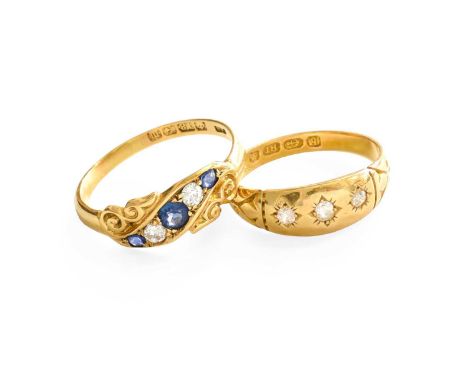 An 18 Carat Gold Diamond Three Stone Ring, finger size M; and An 18 Carat Gold Sapphire and Diamond Five Stone Ring, finger s