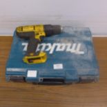A Dewalt DCD776 type 20 cordless drill and a Makita HR2610 hammer drill