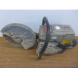 A Makita DPC6400 petrol driven stone cutting saw