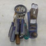 A quantity of woodworking tools including a Record No.4 plane, hand saw, files and chisels