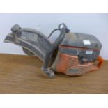 A Husqvarna X-Torq petrol driven stone cutting saw