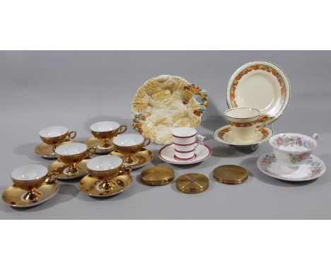 A mid 20thC gilt coloured part tea service, comprising cups and saucers, a Royal Worcester cabinet cup and saucer, another Sh