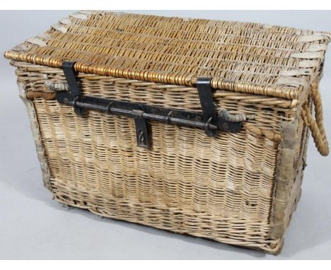 A wicker basket hamper, with heavy metal articulated lock, stamped Sunderland Bendinst 1937, 52cm high, 71cm wide, 43cm deep.