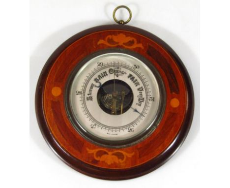 An early 20thC mahogany and marquetry circular hanging barometer, with 14cm diameter dial and brass hook top, 29cm high.