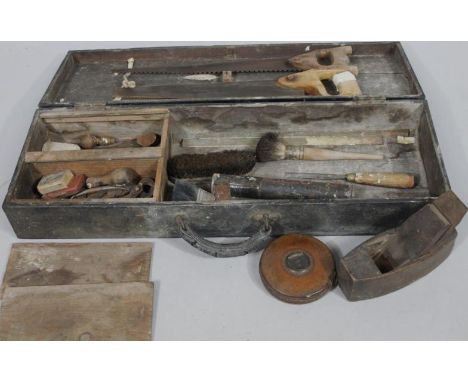 A quantity of various hand tools, etc., contained in an early 20thC stained pine box initialled CEC, and a leather tape measu